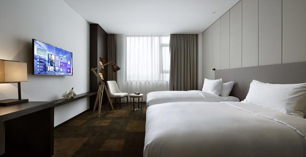 Отель Ease House Luoyang Лоян Номер фото