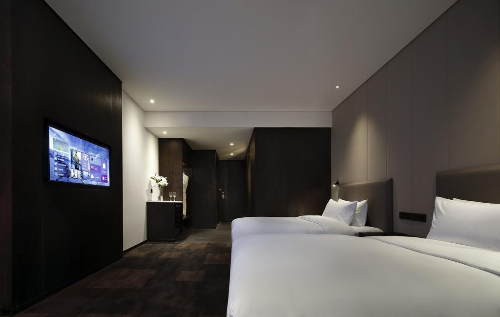 Отель Ease House Luoyang Лоян Номер фото