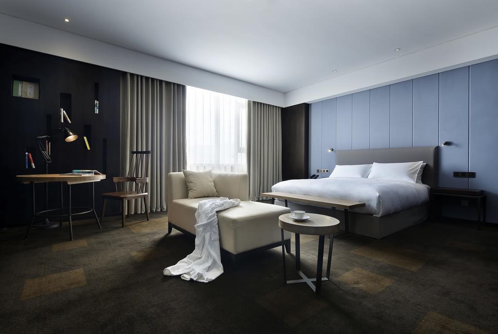 Отель Ease House Luoyang Лоян Номер фото