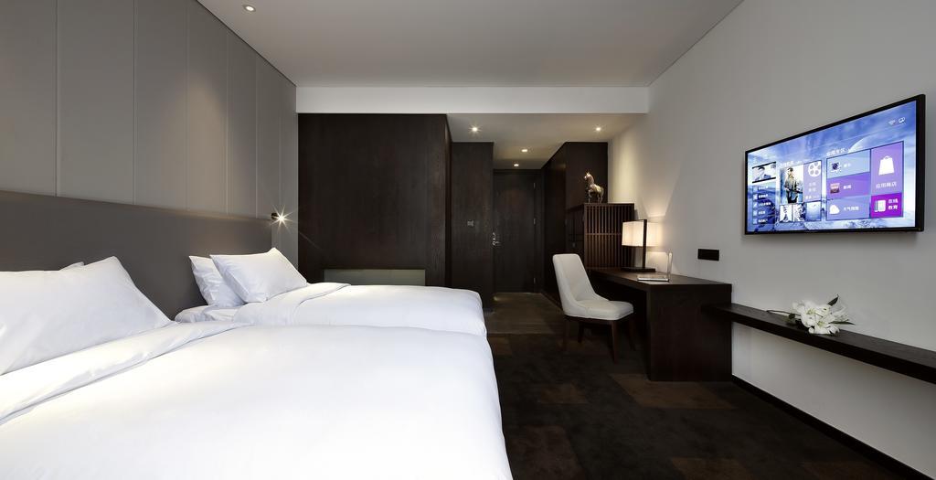 Отель Ease House Luoyang Лоян Номер фото